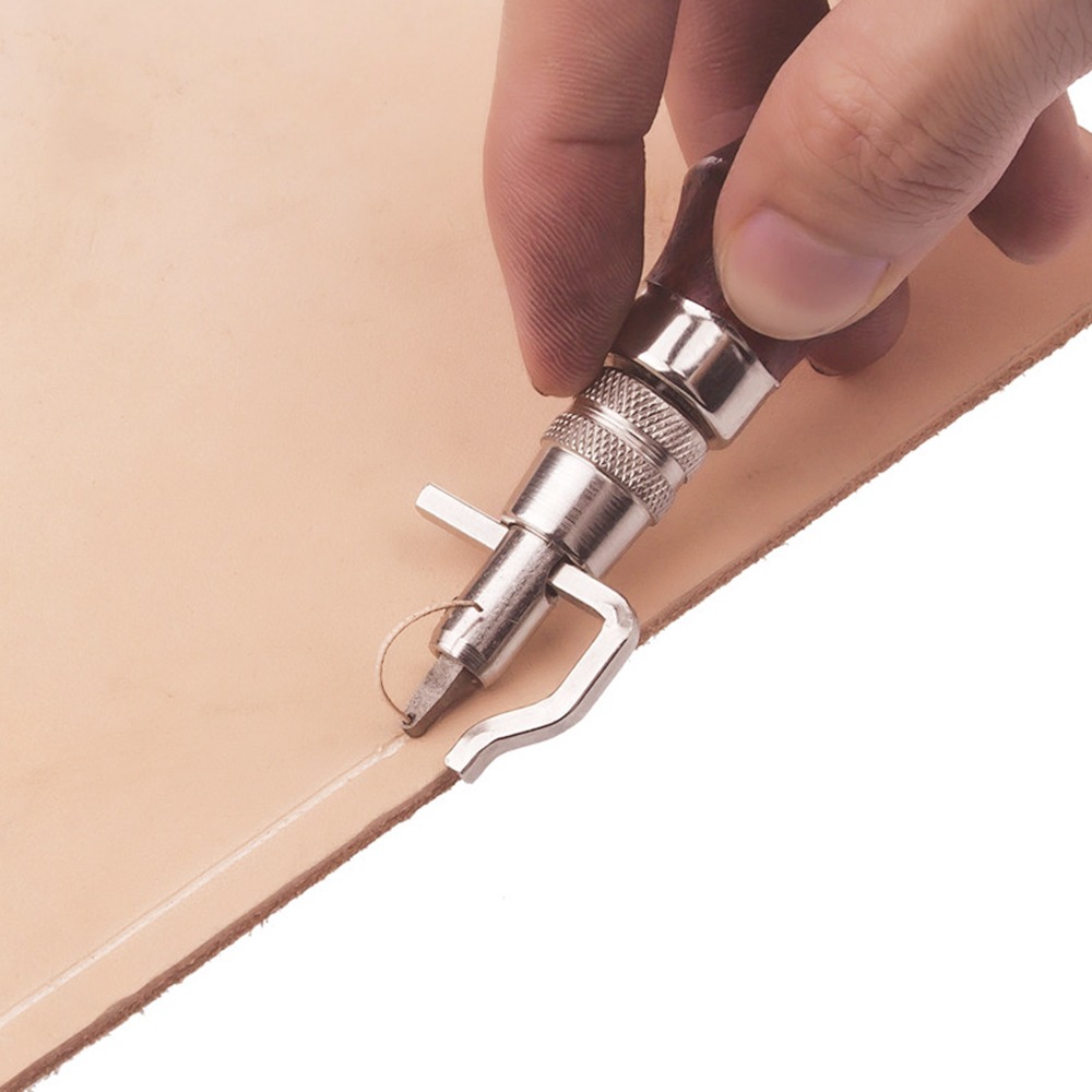 أداة تقطيع وتجعيد الجلد قابلة  - مراجعة Groover Stitching Tool وسعره